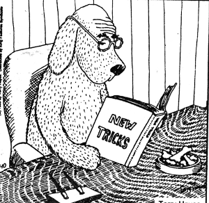 drawing of a dog with glasses reading a book of New Tricks