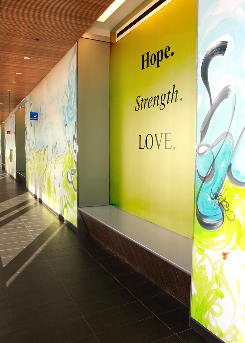 mural in UCSF Medical Center hallway with the words: Hope. Strength. Love.